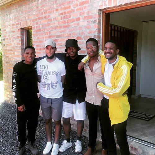 Fundokuhle and his friends in the Hout bay House